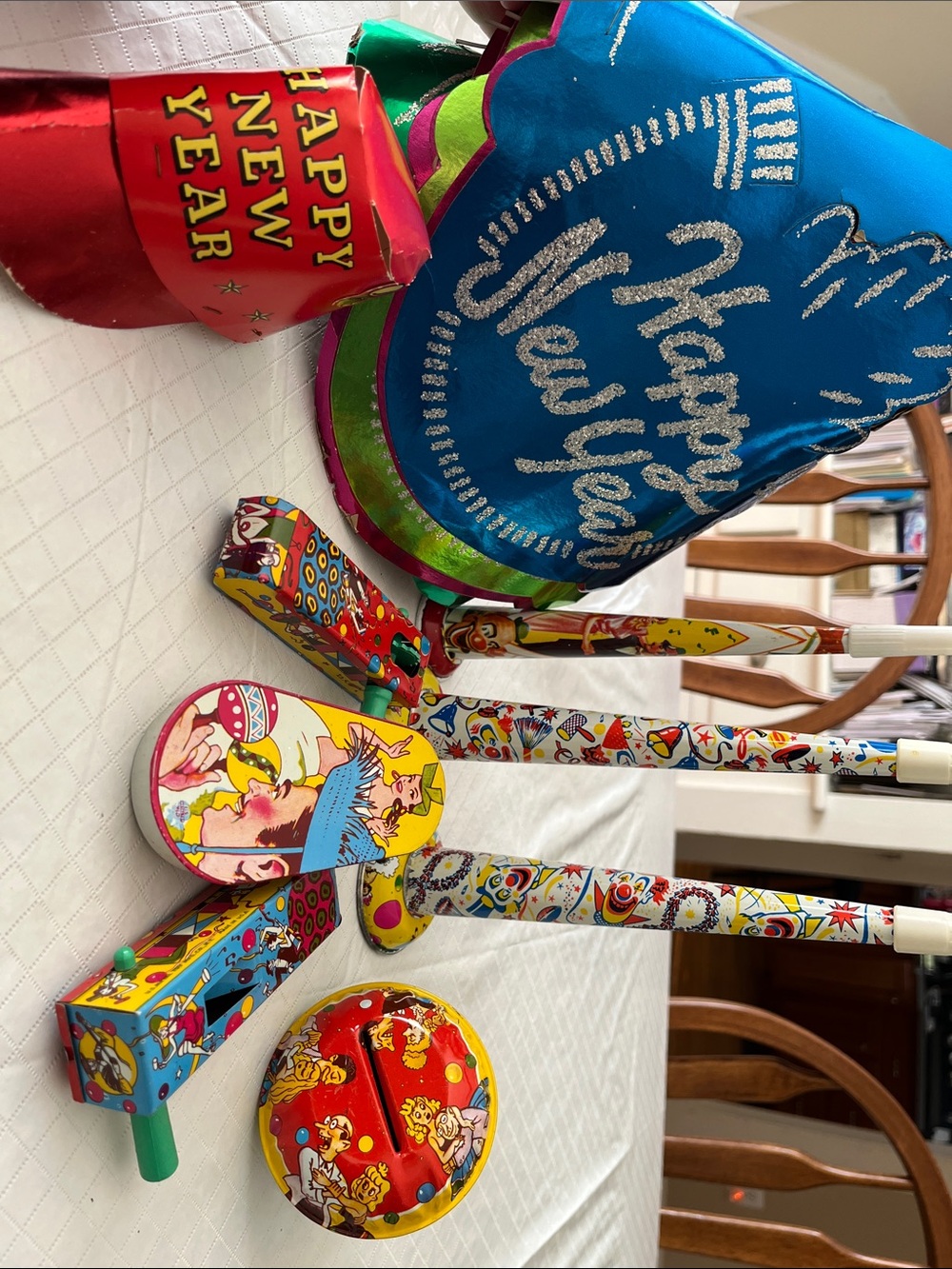 “Happy New Year" Party Hats with Festive Noisemakers